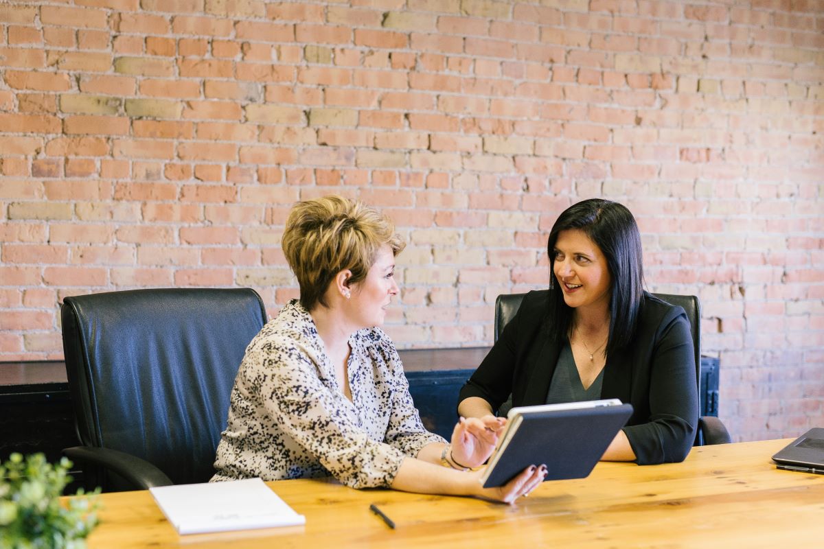 Female leaders sitting and talking