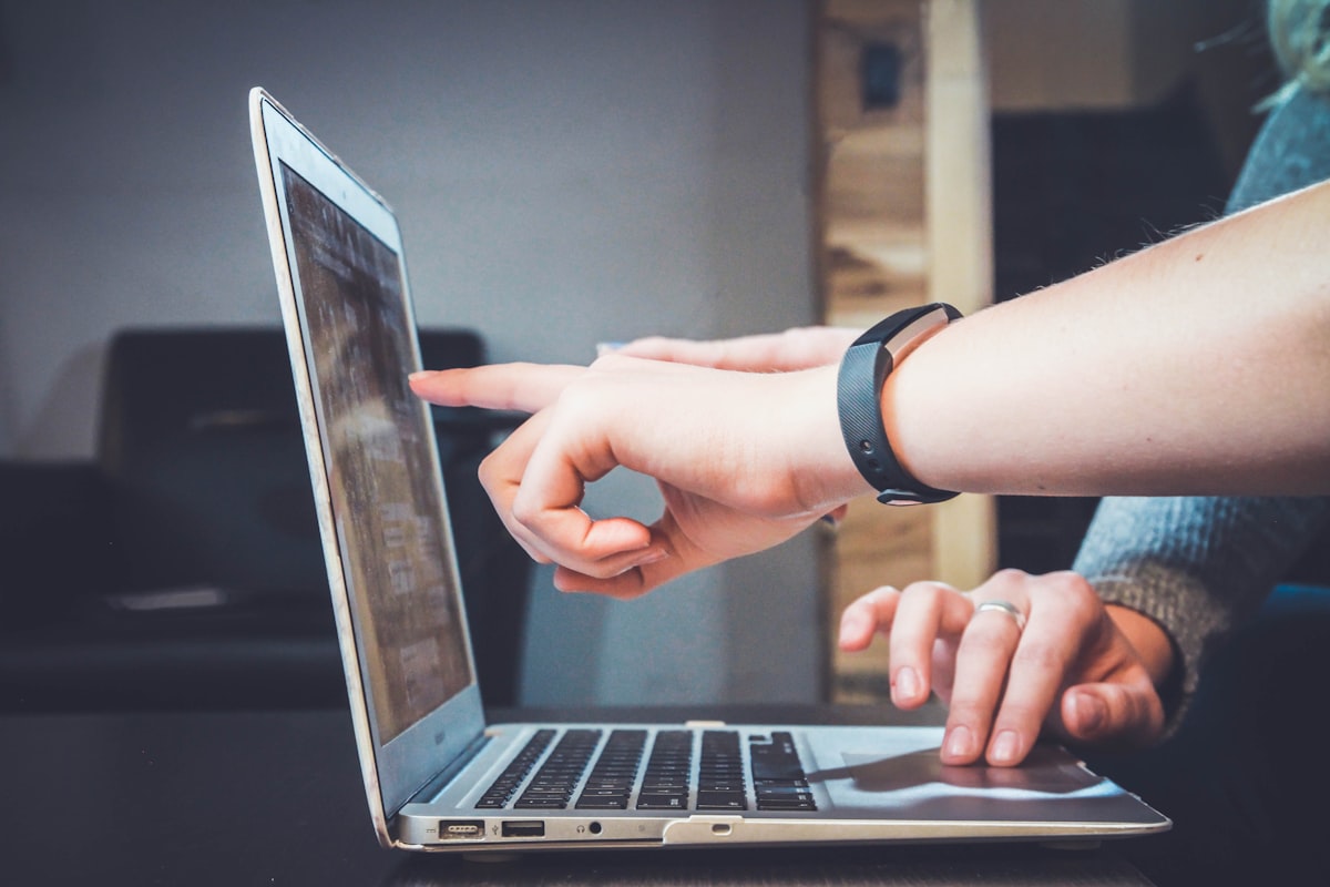 Student learning AI skills on a laptop